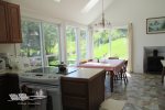 The kitchen table and sliding glass doors